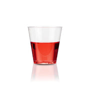 Disposable clear plastic shot glasses with a round base, 2 oz size, ideal for home bars, events, and catering services