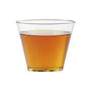 Disposable crystal clear plastic cups, 9 oz, ideal for serving drinks at parties, picnics, and events.