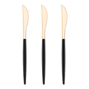 Disposable gold Moderno plastic dinner knives with black handles designed for easy cleanup at casual gatherings