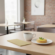 Disposable ivory dinner napkin with smooth paper texture, ideal for events, 16 x 16 inches, sold in 600 count