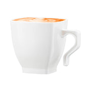 Disposable white plastic mini coffee cups with a 2 oz. capacity, lightweight and sturdy, great for quick cleanup at events