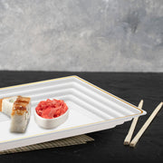 Disposable white serving tray with gold rim adds sophistication to table spreads and party buffets.