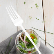 Durable 7" shiny white plastic dessert forks, 240-pack, sturdy enough for cakes, pastries, and other sweet treats