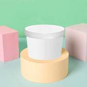 Durable and BPA-free 12 oz squat paper food cups with lids, safe disposable packaging for soups, stews, and side dishes.