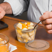Durable and disposable, this 3.25 oz cup and lid set suits food prep, sampling, or delivery needs