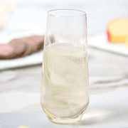 Durable and stylish 9 oz clear stemless plastic champagne flutes, perfect for sparkling wine, mimosas, and festive drinks