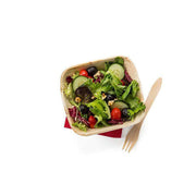 Eco-friendly square bowls on a wooden buffet table, showcasing natural aesthetics for sustainable entertaining