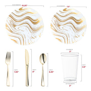 Elegant 10.25" dinner plate and 7.5" salad plate with gold waves, 12 oz tumbler, and cutlery set arranged for wedding