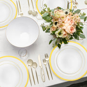Elegant White with Gold Moonlight Round Disposable Dinnerware Set displayed on a formal wedding table with ivory linens and candles