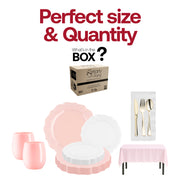 Elegant baby shower tableware set with lotus-rimmed plates, gold utensils, and soft pink and white tones for a refined celebration.