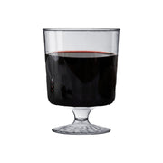 Elegant clear plastic pedestal wine glasses, 8 oz., featuring a classic silhouette, perfect for formal dinners, galas, and celebrations