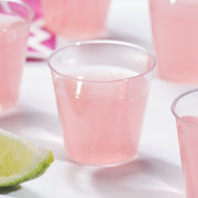Elegant clear plastic shot glasses with a smooth rim, 1 oz size, disposable for easy cleanup; bulk pack of 2500