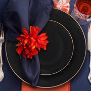 Elegant disposable black plates with a smooth gold rim, round organic design, 7.5-inch diameter, perfect for events, 120-pack