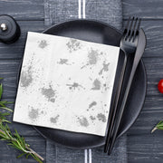 Elegant drink table featuring white and silver cocktail napkins, ideal for events, celebrations, and holiday gatherings