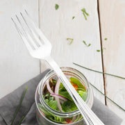 Elegant silver plastic forks with a high-shine metallic finish and textured grooves, 6.75 inches, set of 600