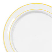 Elegant table setting featuring 7.5" clear salad plates with gold edge rim for weddings and receptions