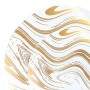 Elegant white dinner plate with metallic gold waves styled for upscale wedding entrée service