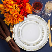 Elegant white round dinner plates with a gold vintage border, made from durable plastic, disposable and practica