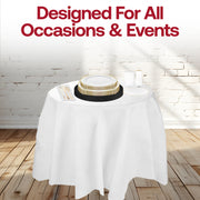 Evening reception table styled with The Hollywood Hangover Package under candlelight and black-and-gold décor.