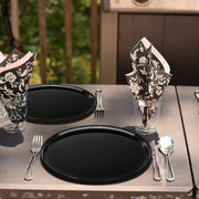 Event-ready black plastic serving tray ideal for coordinated setups with matching black plates and cutlery