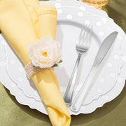 Every component of the White with Silver Dots Round Blossom Disposable Plastic Wedding Value Set is included, offering a complete, sophisticated set for your celebration