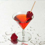 Fancy clear plastic mini martini glasses with a sleek design, 2 oz. capacity, ideal for serving elegant cocktails at upscale parties