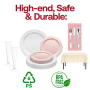 Fancy pink salad plates, white vintage dinner plates, and silver utensils elevate any romantic table decor