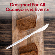 Fancy silver disposable plastic dinner knives with contemporary white handles, perfect for upscale events and celebrations