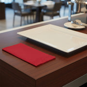 Folded classic red paper napkin with clean edges and rich color, 16 x 16 inches when open, 600-count bulk case