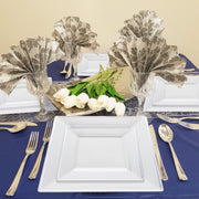 Formal dishes are presented on 9.5" square plates with silver edging during evening receptions
