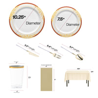 Gold-handle Moderno cutlery and elegant rimmed plates from the Grateful Hearts Package displayed on table.