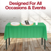 Gold accents elevate the White, Green, and Black sports table setting.
