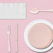 Guests toasting at an afternoon tea using The Soft Girl Set with clear cups, pink decor, and disposable ease
