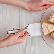 Large plastic spatulas offered a hygienic and efficient solution for hot food handling.