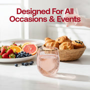 Light pink disposable plastic wine cups with gold trim at an outdoor lakeside picnic, stylish and shatterproof party glassware.