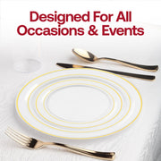 Luxe clear plastic plates with metallic gold rims styled with charger and napkin