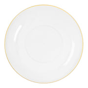 Luxe gold-rimmed salad plates displayed on tablescape with appetizers and desserts