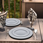 Matte gray plates used to serve appetizers at a sleek event with metallic décor and urban styling
