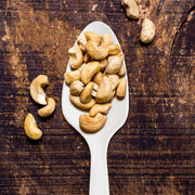 Modern and practical disposable white plastic spoons, great for picnics, office lunches, and quick meals