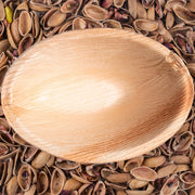 Modern event scene featuring Oval Palm Leaf Eco Friendly Bowls — perfect for appetizers, tastings, and organic themes