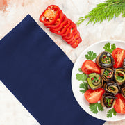 Neatly folded purple paper dinner napkin, thick and vibrant, measuring 16 x 16 inches when open, sold in 600 bulk pack.