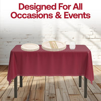 Outdoor Thanksgiving meal served with palm leaf plate and clear stemless wine glasses under string lights.