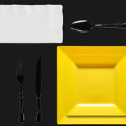 Outdoor setting styled with Elegant Black & Yellow Party Set for a high-energy game night
