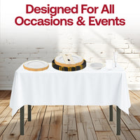 Outdoor wedding table set with The Golden Hour Package, ivory linens, and white with gold marble napkins in the sunset glow