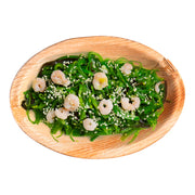 Oval Palm Leaf Bowl displayed with a vibrant shrimp and pimento salad, perfect for stylish eco-friendly party serving