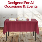 Party decor complemented by the Kiss at Midnight Sets rich tones and elegant tableware.