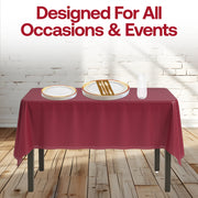 Party decor complemented by the Kiss at Midnight Sets rich tones and elegant tableware
