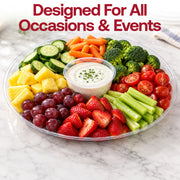 Party table with 18" plastic round trays displaying mini sandwiches and party snacks in elegant layout.