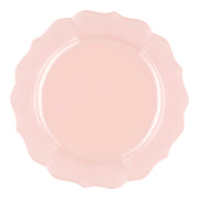 Pearl pink round plastic appetizer and salad plates with a lotus-inspired design