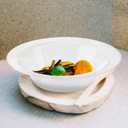 Plastic dessert bowl filled with tropical fruits like pineapple and oranges for wedding